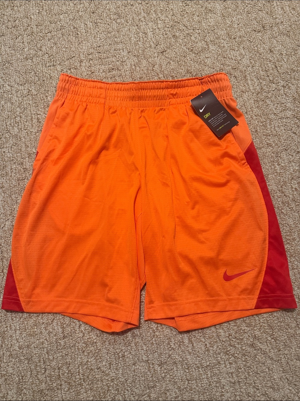 Nike Women’s Orange Athletic Shorts with Red Accents